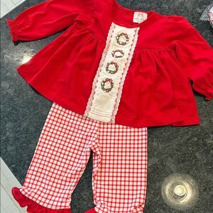 Red and White Baby Outfit with Wreath Accents
